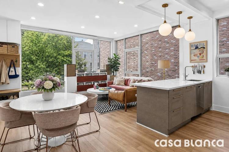 Apartment 2A at 128 Newton Street is a beautifully designed two bedroom, two bathroom floor thru condominium offering approximately 976 square feet of thoughtfully laid out living space in the ...