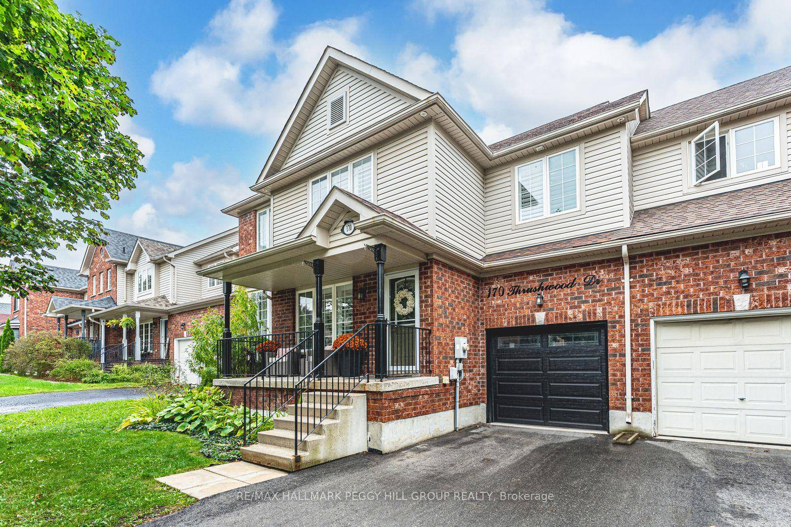 SHOWSTOPPING TOWNHOUSE WITH DESIGNER FINISHES, A FINISHED BASEMENT WITH WET BAR, amp ; A PRIVATE BACKYARD RETREAT !