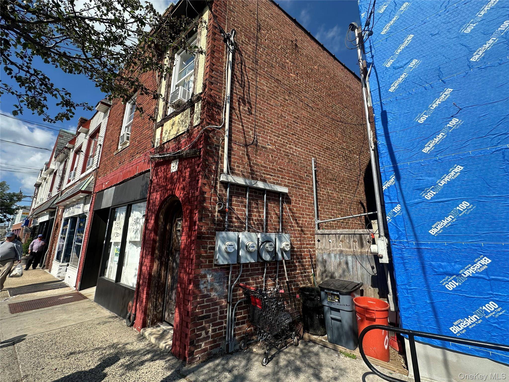 1500 Sq Ft Retail Space with sidewalk entrance basement off a busy shopping street.