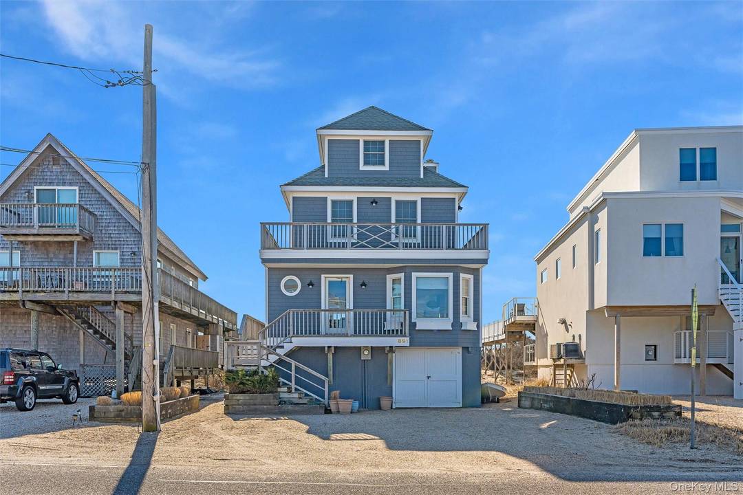 This Dune Road beach house features 5 bedrooms amp ; 3.