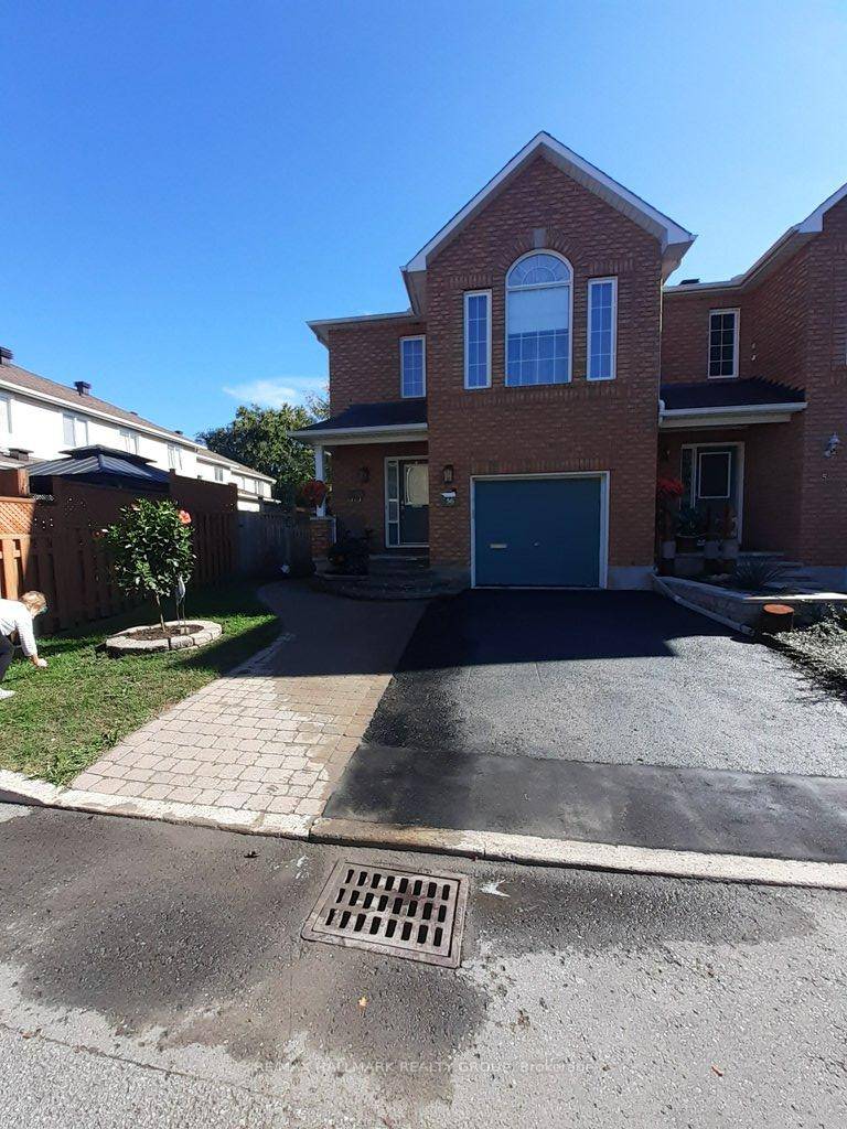 Immaculate End Unit Freehold Townhome Original Owner.