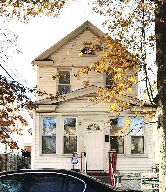 Welcome to 109 66 153rd Street a beautifully renovated single family Colonial residence nestled in a quiet, tree lined neighborhood of Jamaica, Queens.