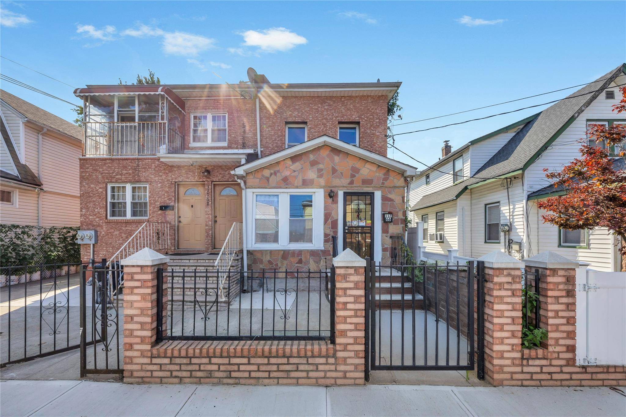 Welcome to this beautifully maintained semi attached Colonial nestled in one of South Ozone Park s most desirable residential pockets.