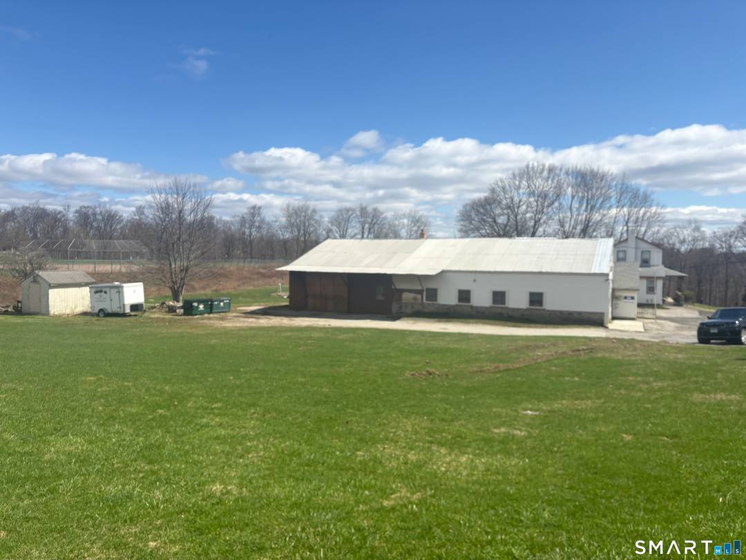 Ideal Business Location. Commercial Space includes 1500 sq ft Warehouse Space with 15 ft Ceilings, 1500 sq ft Shop, 675 sq ft Retail Storefront, 300 sq ft Office Space, Garages, ...