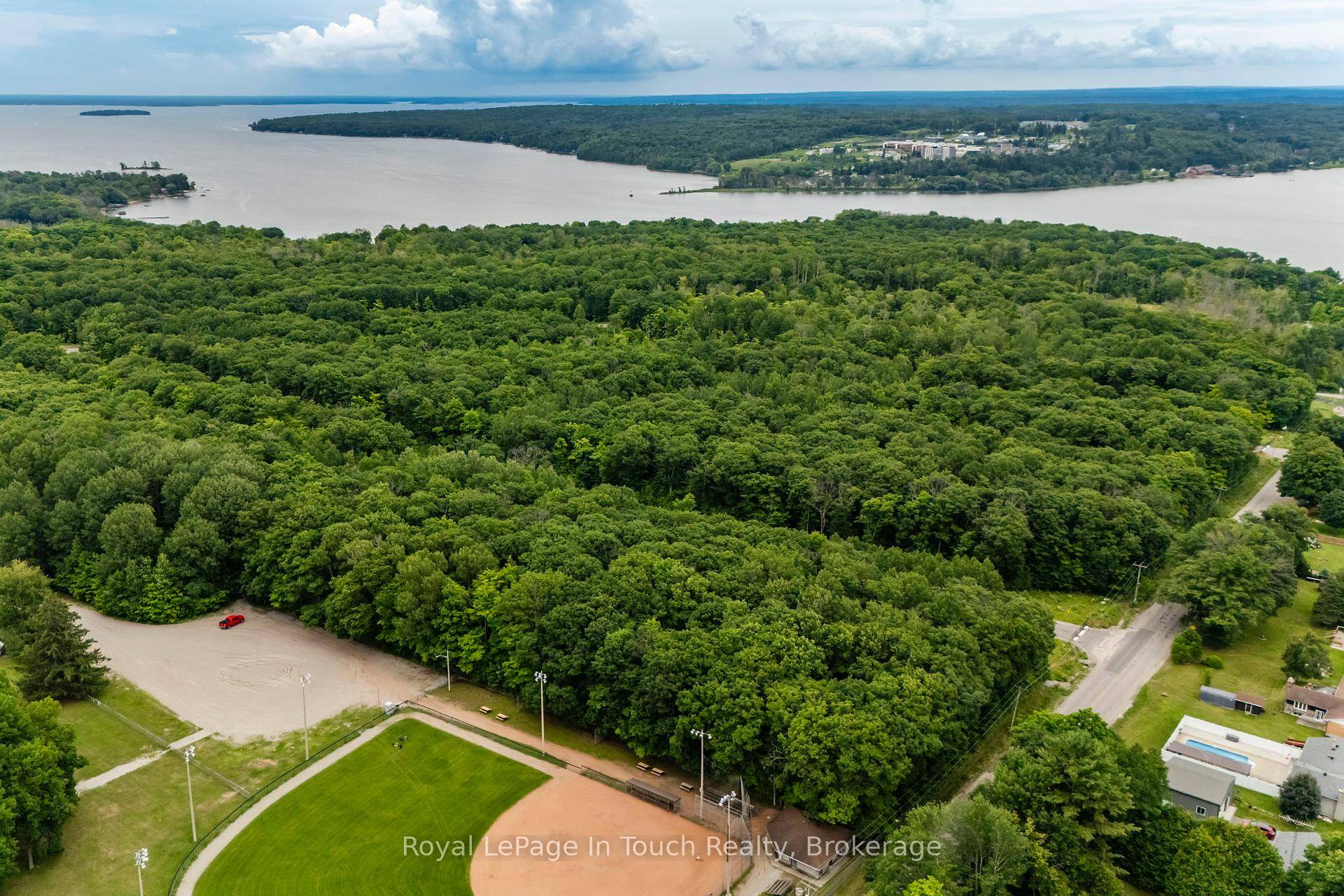 Well treed building lot located in the Toanche Settlement within minutes to a marina, boat launch, park amp ; playground.