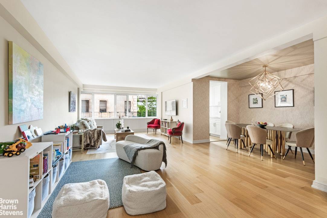 NEW PRICE ! A beautiful, gut renovated oversized 2 bedroom 2 bathroom home with views of the East River and 59th Street Bridge in a full service cooperative with a ...