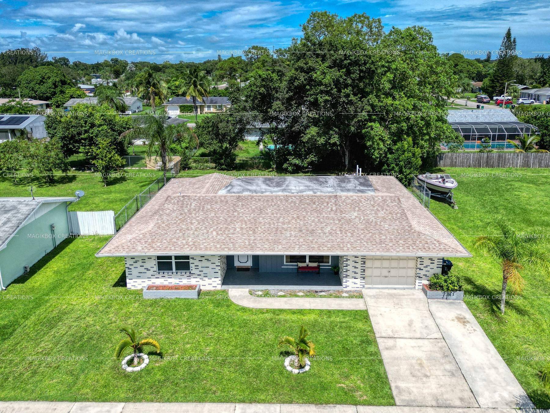 Immense 4 bedroom 2 bath 1 large car garage single family dwelling in the heart of Port St Lucie.