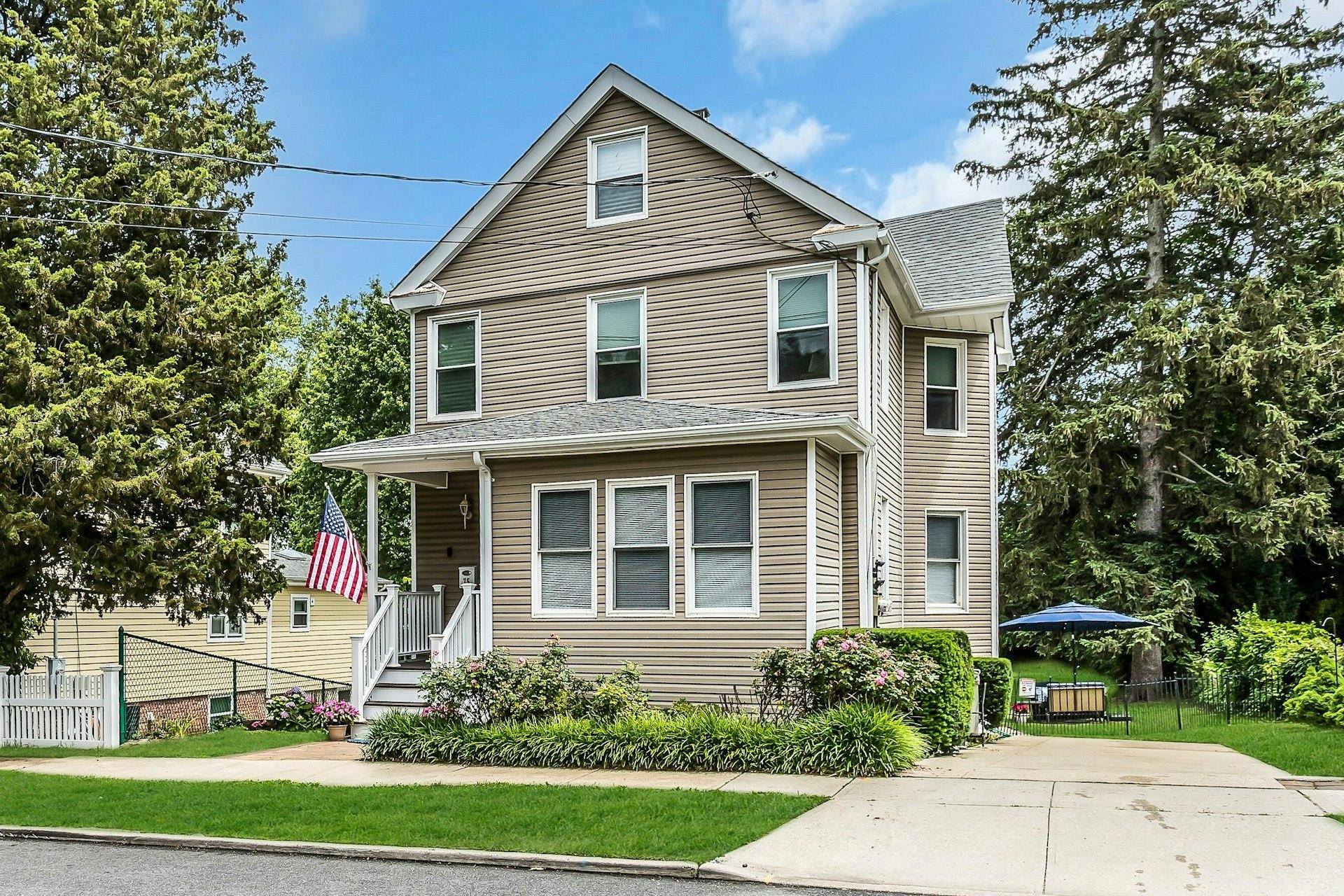 Beautiful 2 family colonial on an oversized lot in the heart of Oyster Bay.