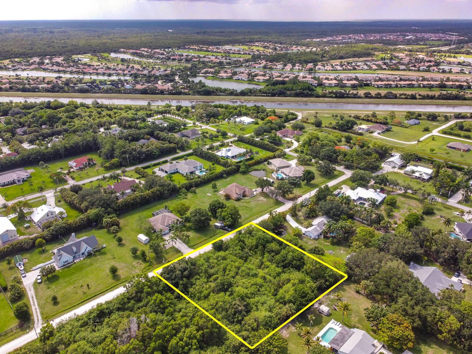 This 1. 15 acre parcel lot is one of the few remaining vacant lots in Palm Beach Country Estates.
