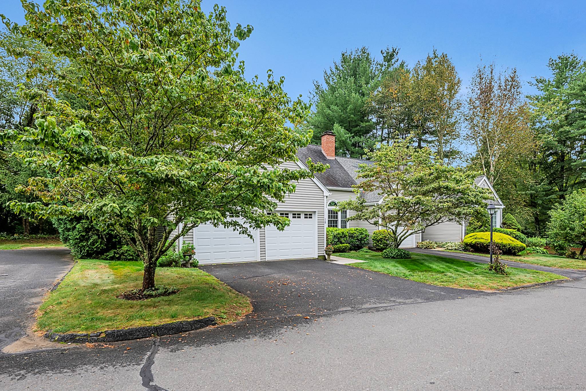 Experience the charm of Woodbury's most desirable condominium community at 18 Woodbury Hill.