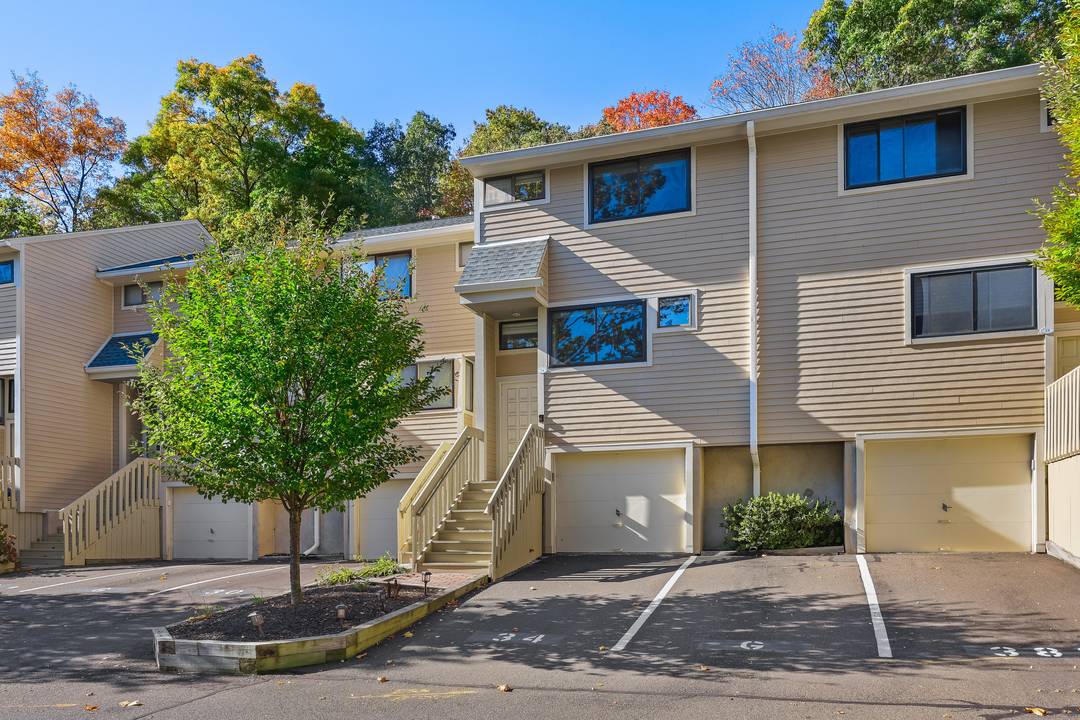 Three level Norwalk townhouse 3 beds 11 2 baths open concept living dining with sliders to private deck attached oversized one car garage updated kitchen pet friendly community with pool, ...