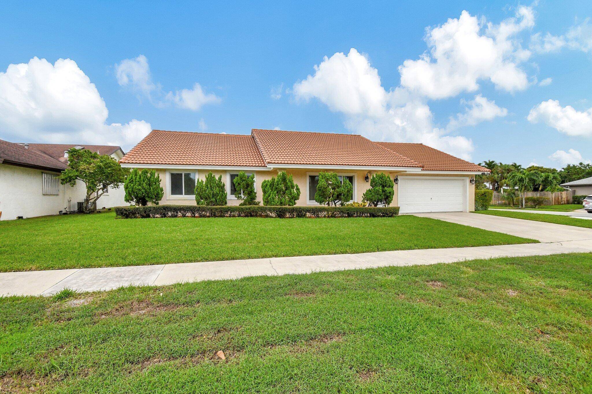 Welcome Home to This Beautiful Updated 3 Bedroom, 2 Bath Residence with a 2 Car Garage in the Desirable Community of Pheasant Walk.