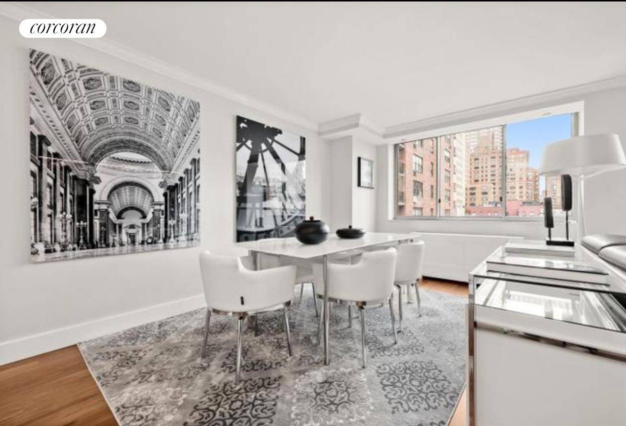 Welcome to this beautifully renovated, sun drenched split 2 bedroom, 2 bathroom home in the prestigious Wellington Tower Condominium.
