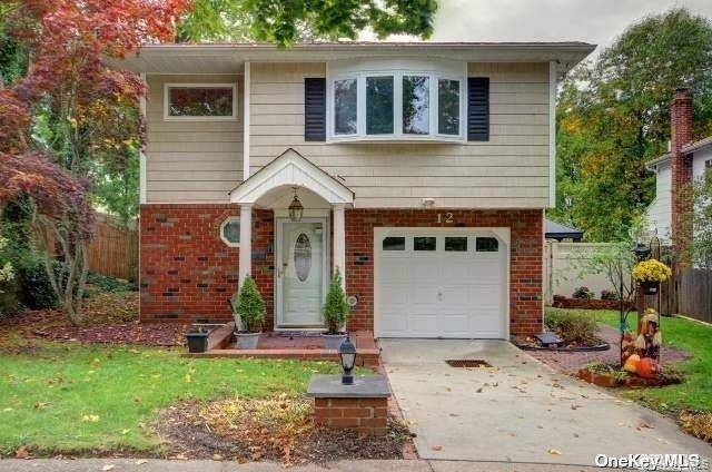 Welcome to this stunning high ranch style centrally air conditioned home located on a peaceful cul de sac in a desirable neighborhood.