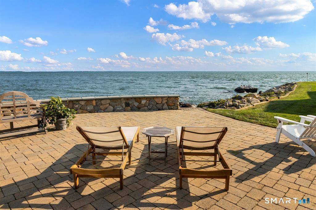 A rare opportunity to enjoy this stunning luxury waterfront home located in desirable Cornfield Point Beach.