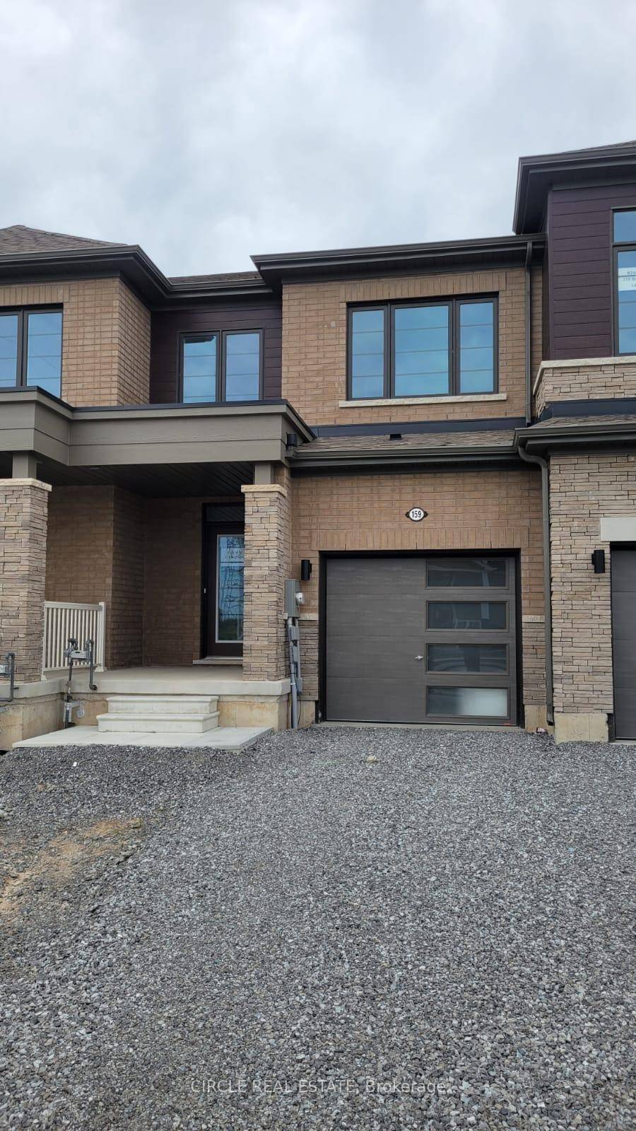 Modern townhouse is nestled in a vibrant neighborhood, featuring numerous enhancements and contemporary charm.