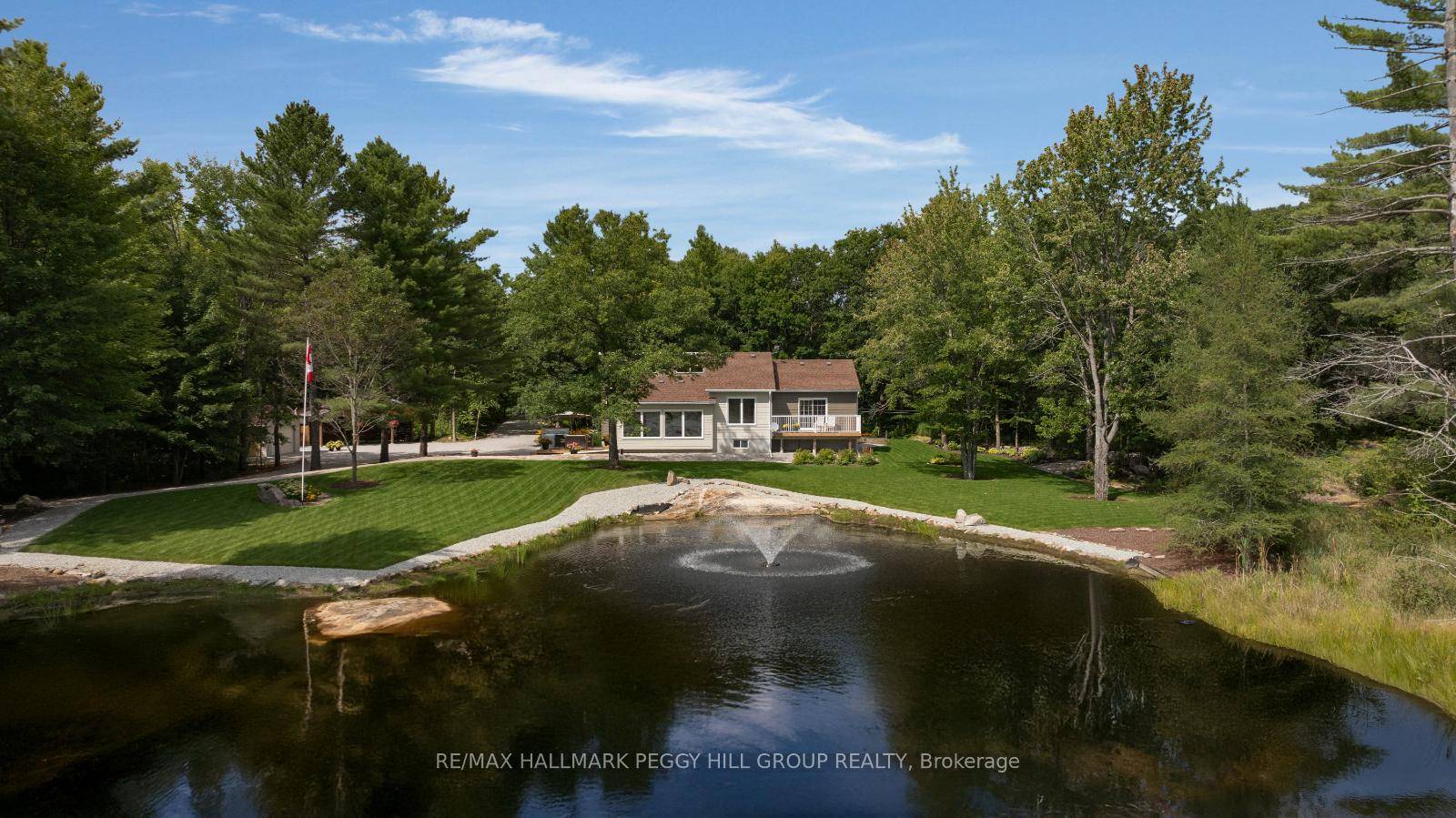 SOLD FIRM, AWAITING DEPOSIT REMARKABLE RETREAT WHERE REFINED LIVING MEETS THE NATURAL BEAUTY OF MUSKOKA ON NEARLY 90 PRISTINE ACRES !
