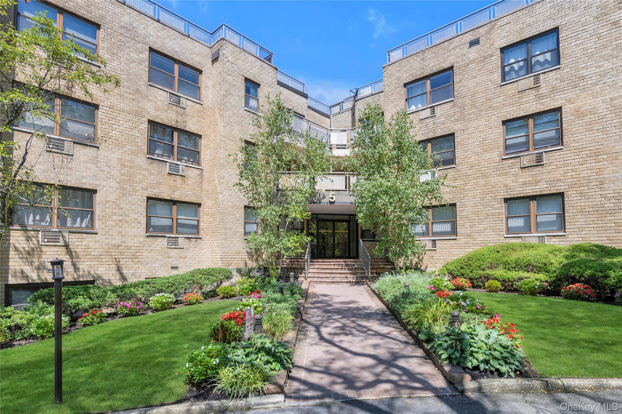 Perched on the top floor, this bright and spacious Jr 4 co op in one of Great Neck's best buildings is located in the heart of town.