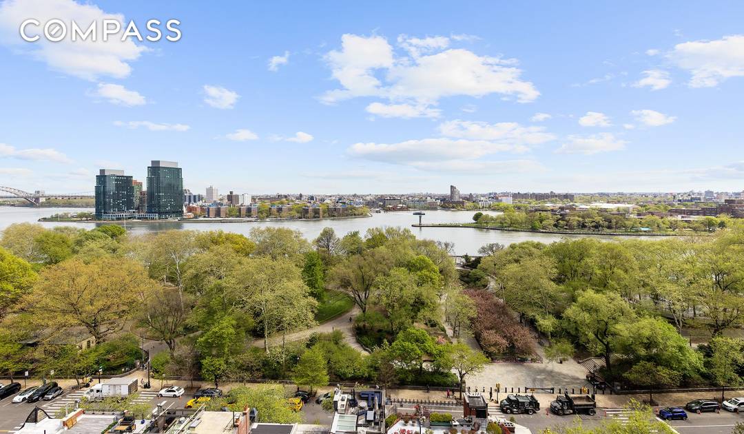 This expansive two bedroom convertible three, two and a half bath corner residence offers breathtaking, panoramic views of the East River and Carl Schurz Park from all but the secondary ...