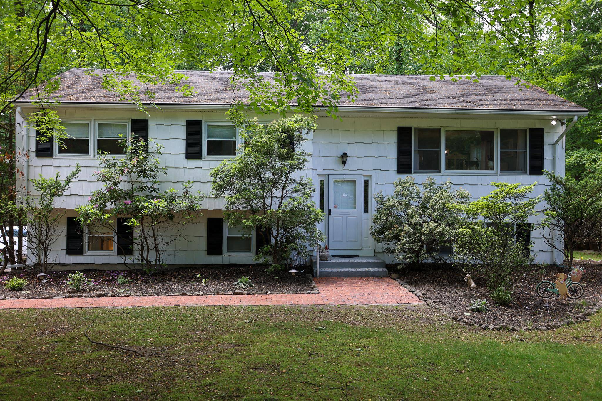 Nestled in the serene village of Airmont, this charming bilevel high ranch home offers a perfect blend of space, style, and convenience, all set on just under an acre of ...