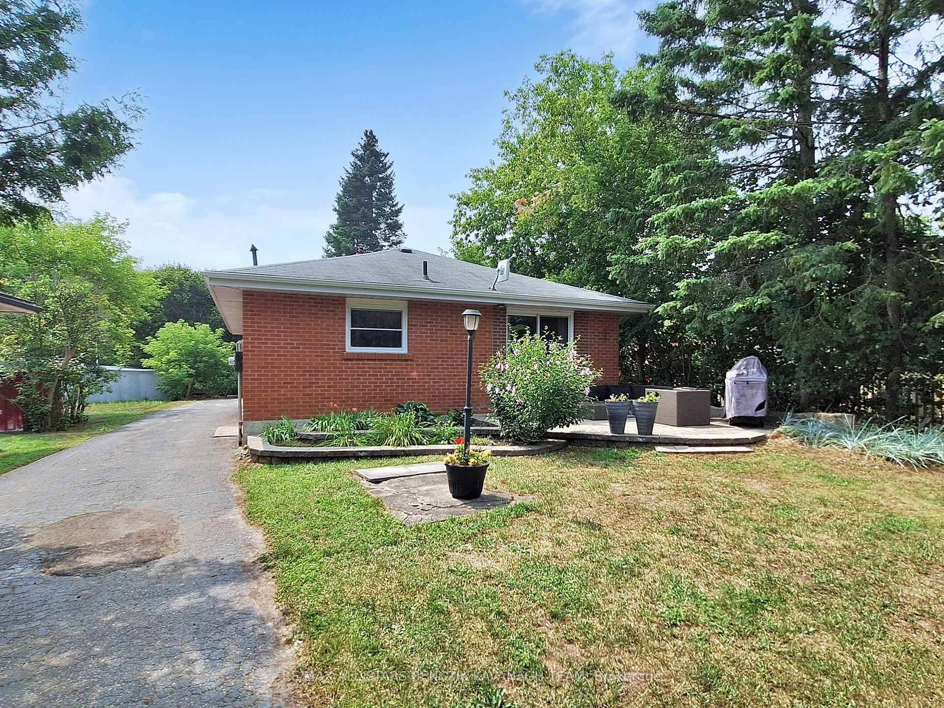 Charming 3 1 bedroom renovated bungalow nestled on a deep and private 0.