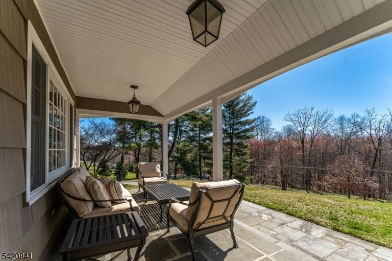 Nestled on approx 1 acre of picturesque property, this charming 5 bedroom, 2 bath Expanded Cape Cod style home in Chatham Township offers a rare blend of classic character serene ...