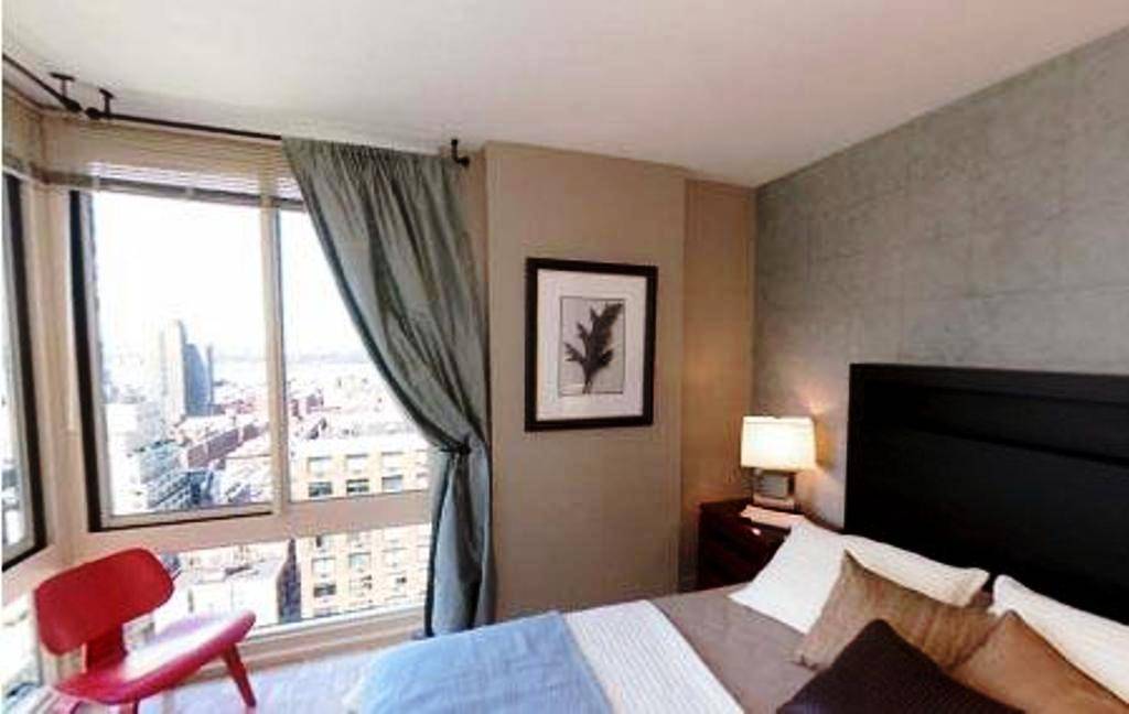 TRENDY Hells Kitchen Studio, West 50's, 8th Avenue, Roof top deck, Gym, Gorgeous city views, NO FEE