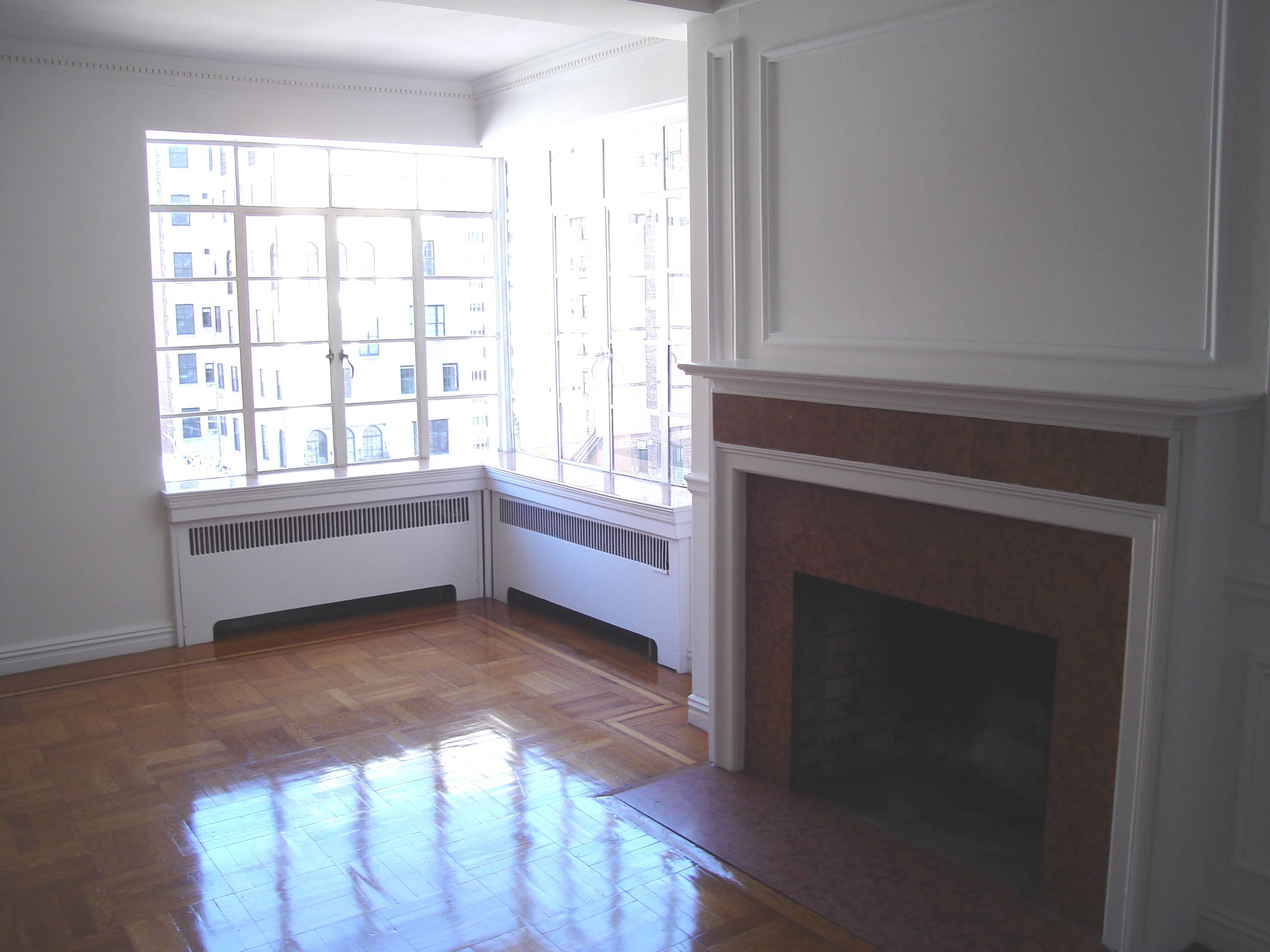 UES APARTMENT WITH WOOD-BURNING FIREPLACE