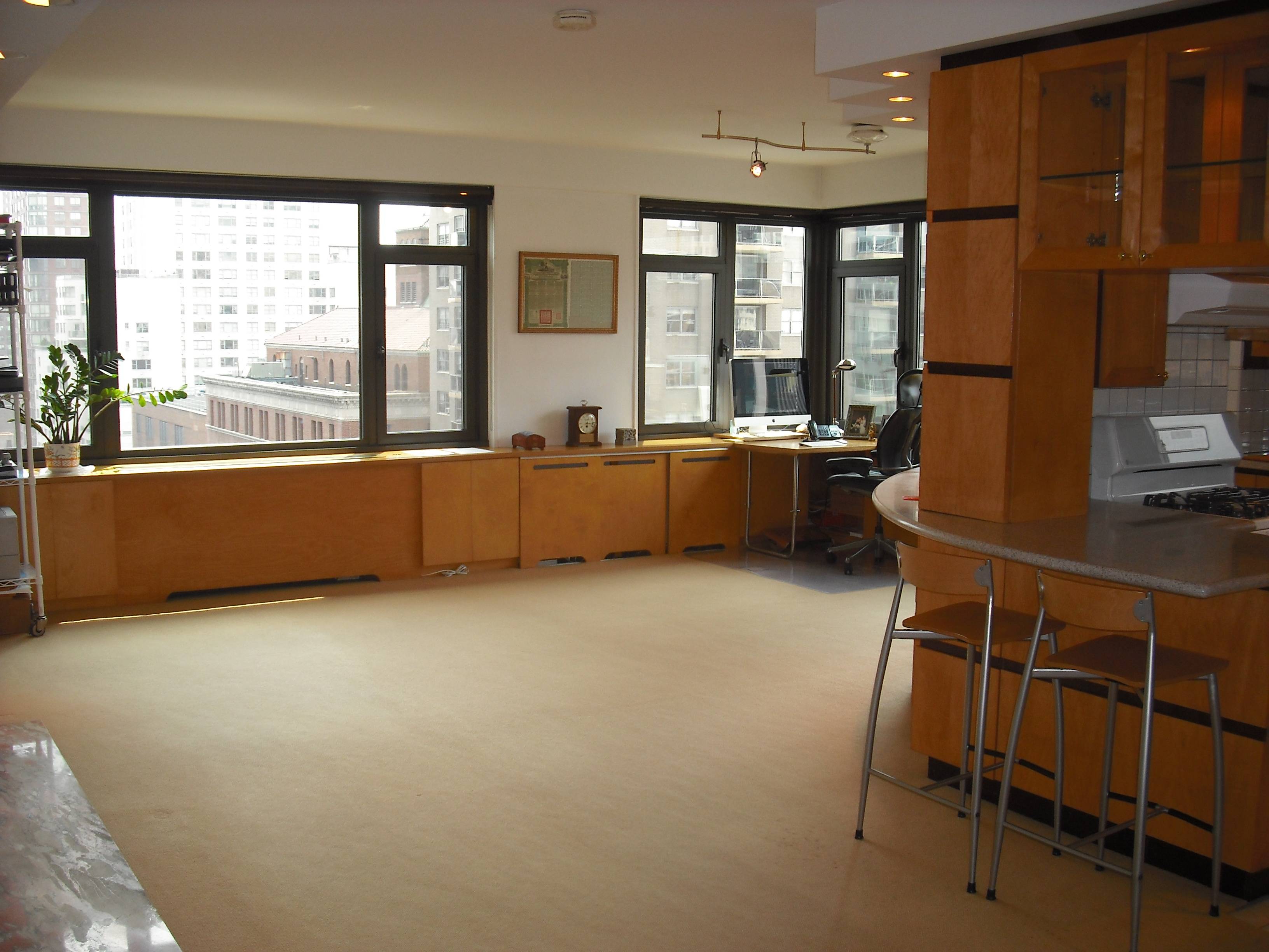 PRICE REDUCTION: $1,280,000 2 Bedroom, 2.5 Baths, Wrap-Around Windows, Breathtaking Views, Abundant Natural Light, Wine Cooler, Upper East Side Co-op for Sale. Luxury Doorman Building. New York City Apartment For Sale.
