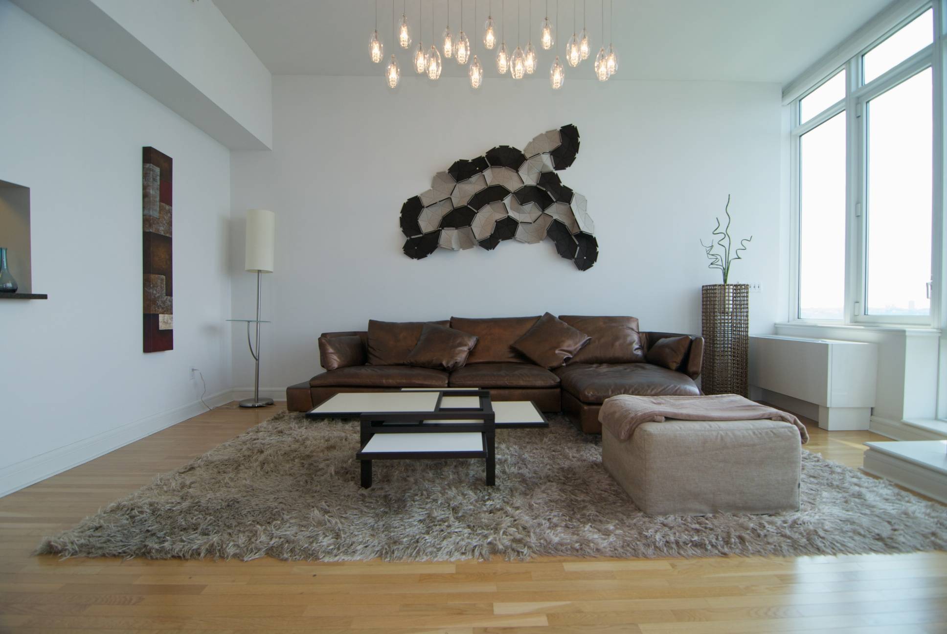 Large 2 Bedroom With Beautiful River views and loft- like 12 ft. High Ceilings - Partially Furnished