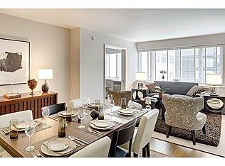 SPECTACULAR CONDO - MIDTOWN EAST!