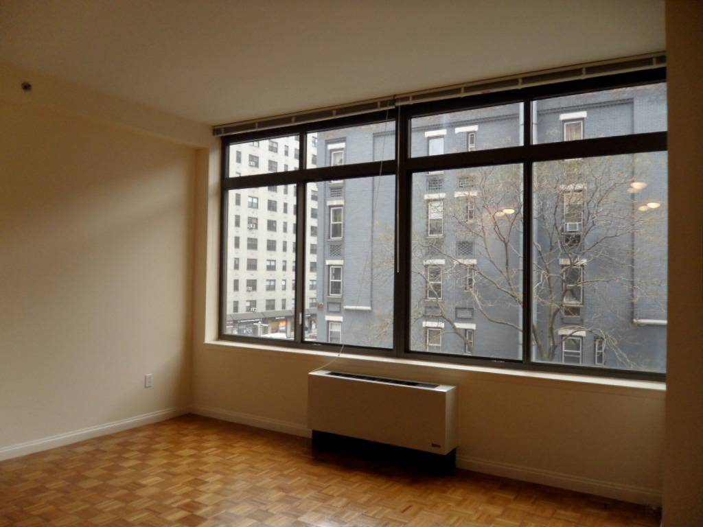 UES***NO FEE***ALCOVE STUDIO**LUX BLDG**OPEN CITY VIEWS !!!