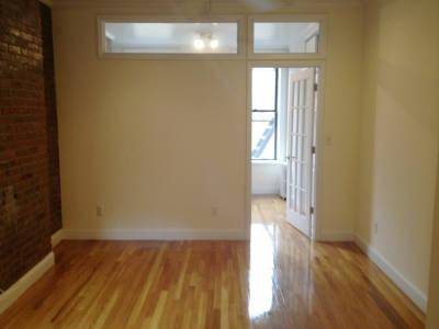 ONE BEDROOM WITH FRENCH DOORS & EXPOSED BRICK IN NoLita! 