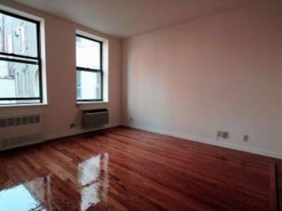 Two Bedroom in the Village! Located on a tree-lined street! Spacious!