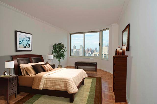 NO FEE * Spacious One Bedroom * Nine Foot Ceilings * Water Filtration System * 50-ft Lap Pool * Garage * UES