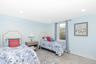 Bedroom featuring baseboards and recessed lighting