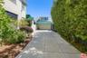 Gated driveway to garage