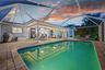 Pool and lanai in the evening