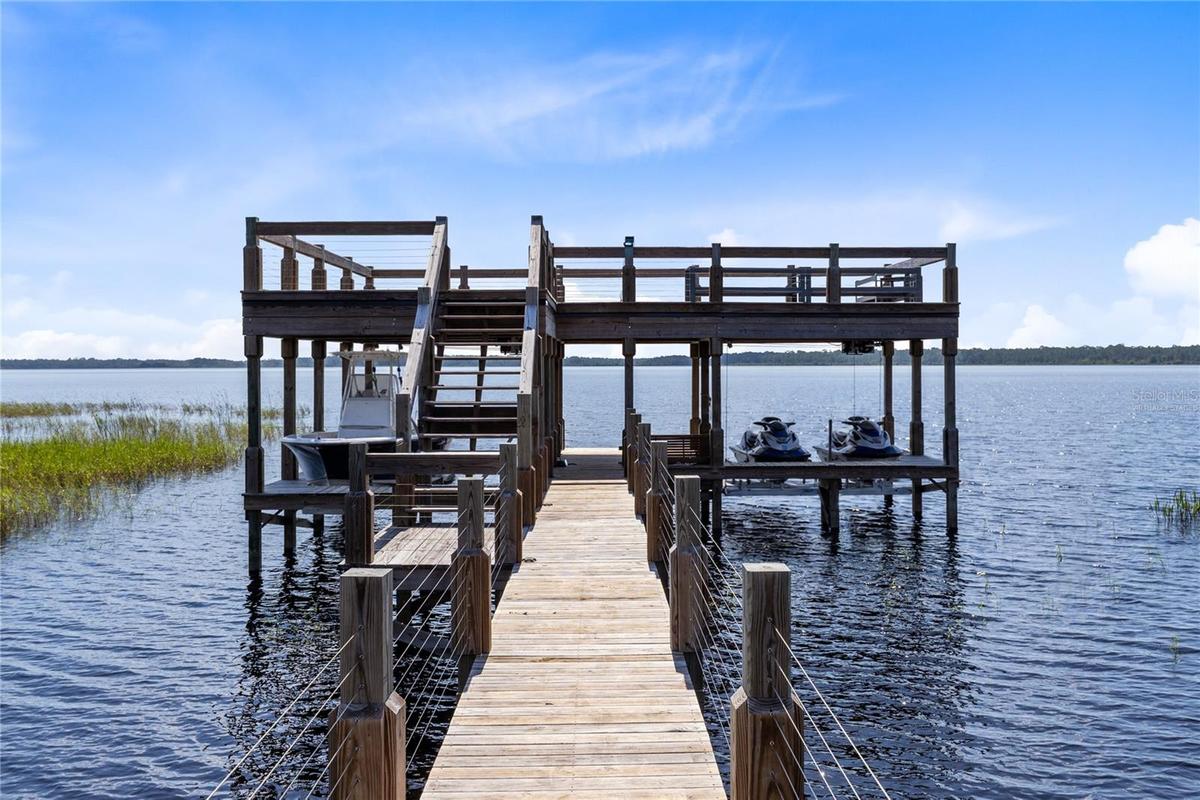 Existing double deck boat dock. Boats have been virtually added to illustrate potential use.