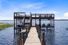 Existing double deck boat dock. Boats have been virtually added to illustrate potential use.