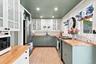 Brand new kitchen with window out to courtyard, new appliances and highhats