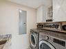Laundry room with granite folding area