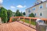 Deck featuring a lawn