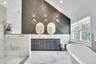 Beautifully renovated showstopper of a bathroom.