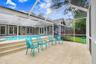 Step down patio area overlooking the backyard.
