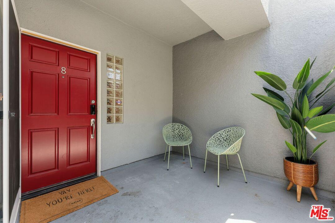 Exterior unit entry with a red