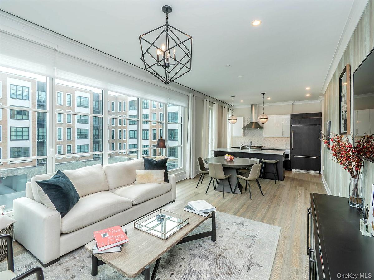 An airy open layout allows the living room to serve as the heart of the home, ideal for entertaining guests.