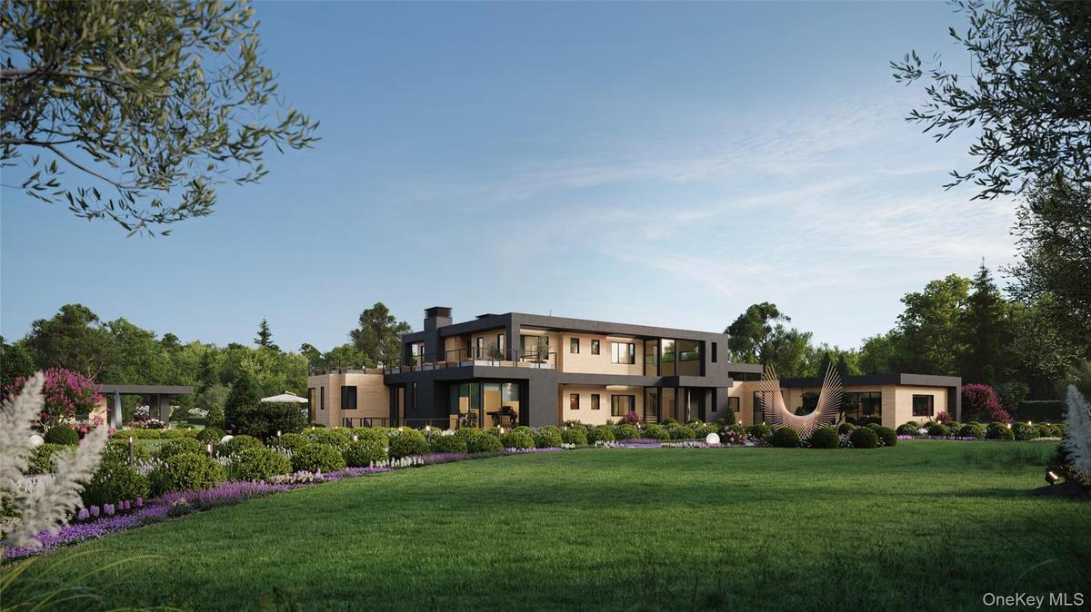 A striking contemporary estate set on expansive, manicured grounds.