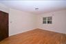 3rd Floor Bedroom featuring light wood-style floors and baseboards