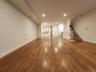 Amazing cavernous Living Room and Dining Room! These floors are absolutely stunning!